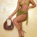 Sarong is used for beachwear as a cover up for a sexy designer bikini or worn as a dress, skirt, or other piece of clothing