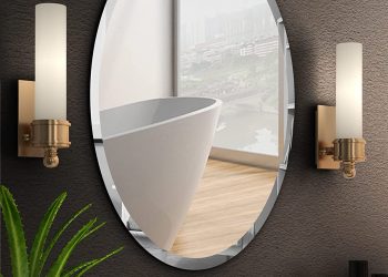 Frameless mirrors are a popular choice in bathrooms for a few likely reasons