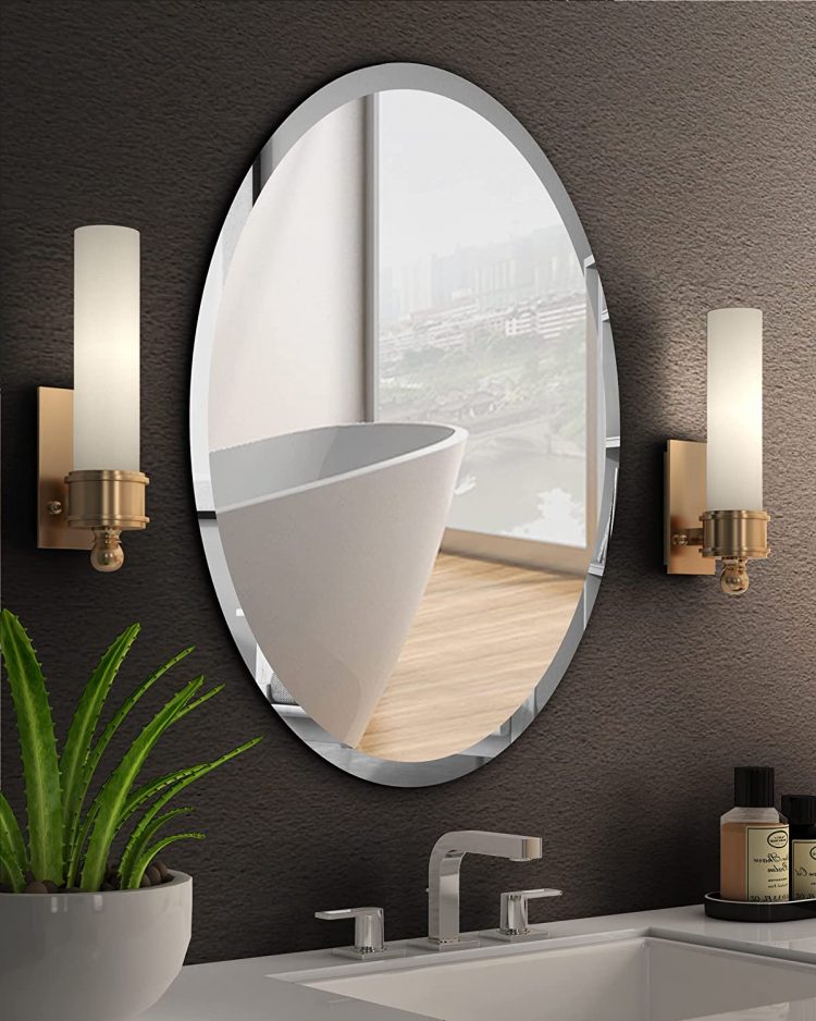 Frameless mirrors are a popular choice in bathrooms for a few likely reasons