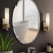 Frameless mirrors are a popular choice in bathrooms for a few likely reasons