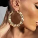 Being a perfect circle, hoop earrings symbolize wholeness, unity and infinity