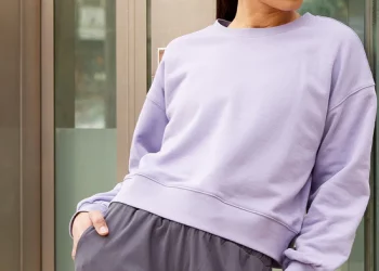 Crew neck is a type of shirt or sweater that has a round neckline and no collar, often worn with other layers