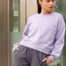 Crew neck is a type of shirt or sweater that has a round neckline and no collar, often worn with other layers