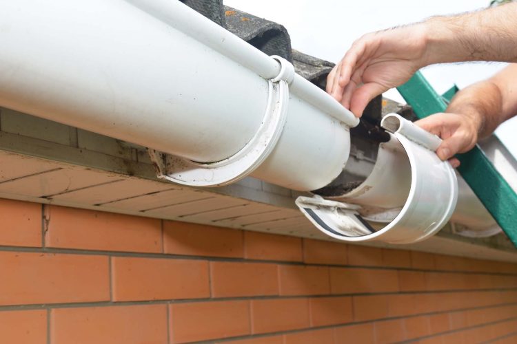 End piece of a gutter section that keeps stray debris or water from flowing out of the guttering