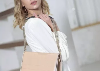 Shoulder bag is a handbag or purse with at least one strap attached to it that is long enough to fit over the shoulder