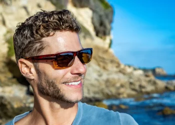Polarized sunglasses reduce glare from light-reflecting surfaces like water, glass, and snow