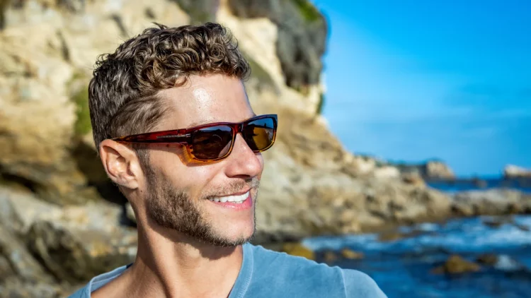 Polarized sunglasses reduce glare from light-reflecting surfaces like water, glass, and snow