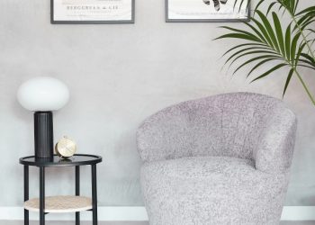 You can rest your arms on the armrests of an armchair, which is a comfy, cushioned chair