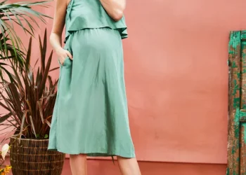 Pregnant woman’s outfit intended to accommodate her growing frame throughout this time of life
