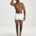 Medium-length boxer briefs are longer, more generously covered, and more square in shape