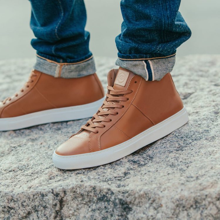How should men dress with casual sneakers?