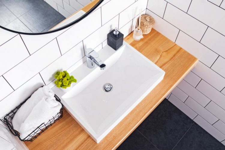 How do you get rid of bathroom waste?