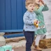 What are some of the benefits of dressing a baby?