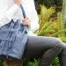 Why do so many individuals seem to enjoy carrying bags around?