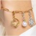 What do charms symbolize?