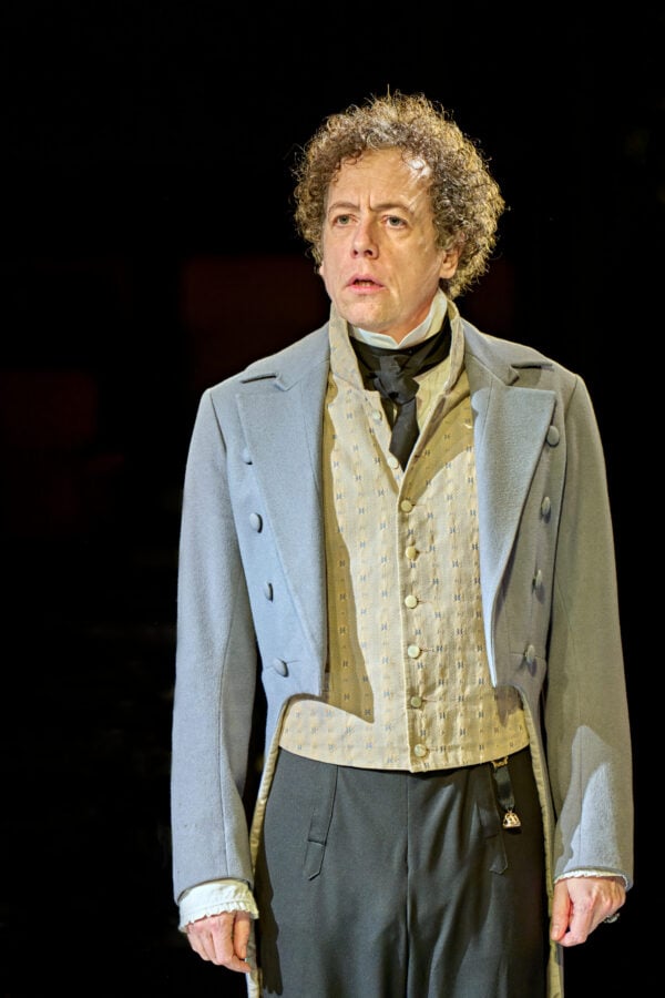 Matthew Steer performing in an Arcadia stage scene