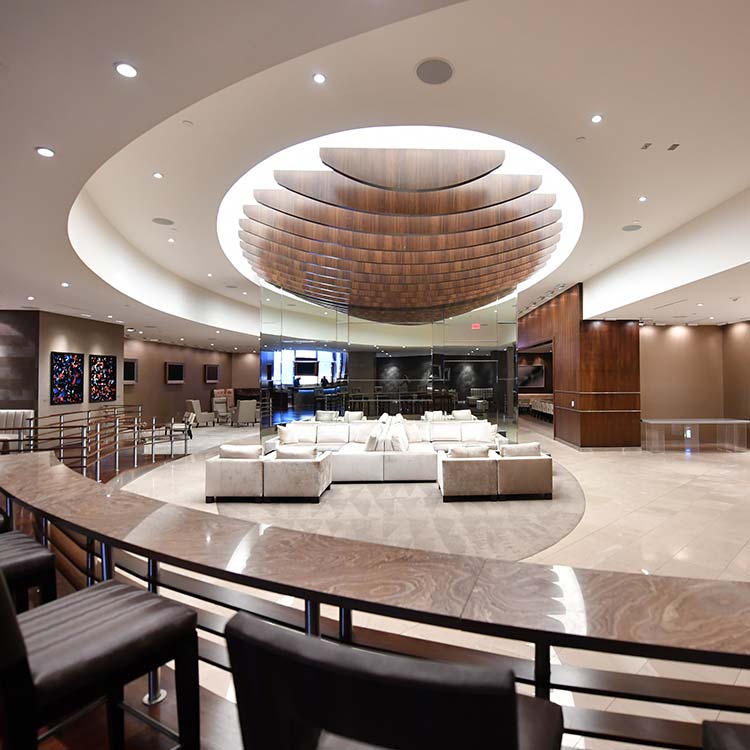 Guests visiting an exclusive area on the AT&T Stadium Owner’s Experience Tour