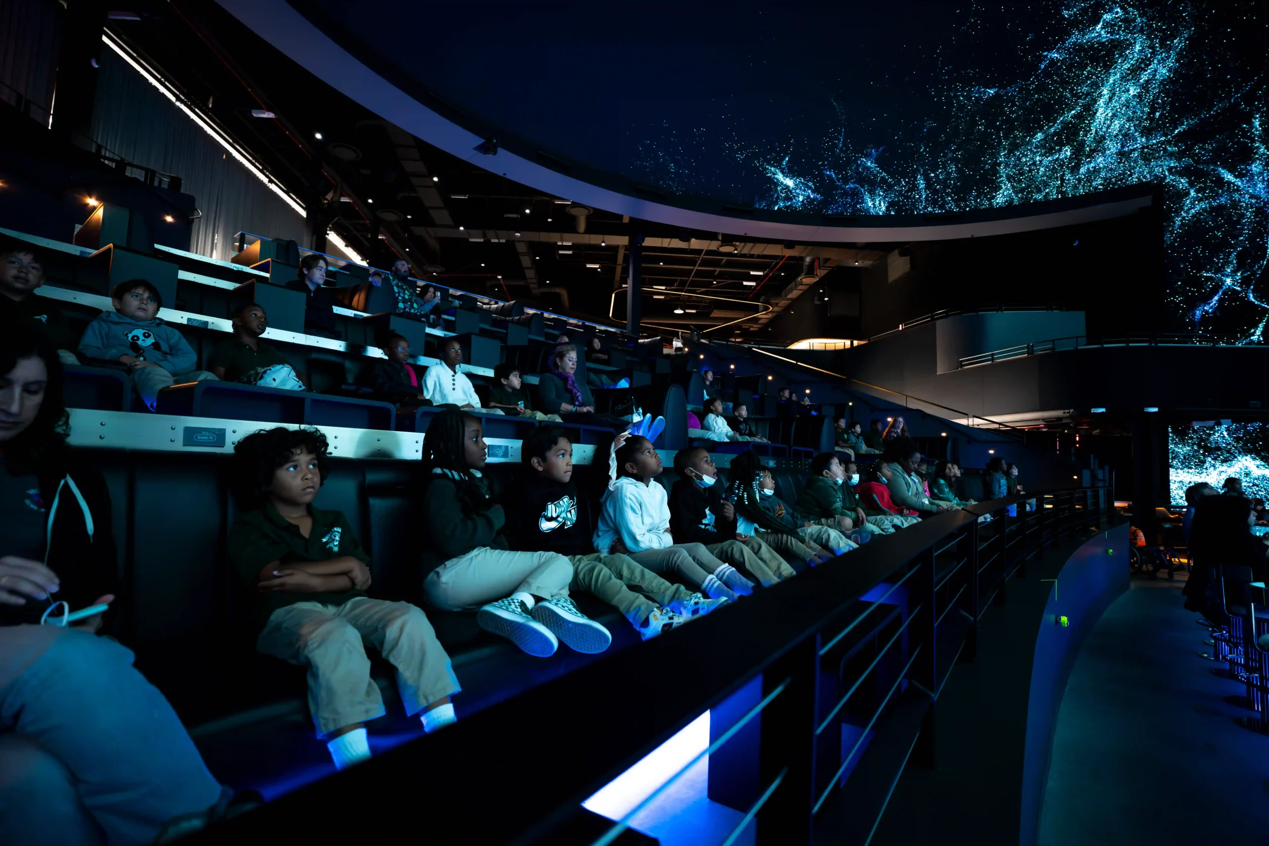 Students taking part in an immersive Cosm field trip