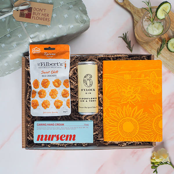 A selection of treats inside a custom gift box