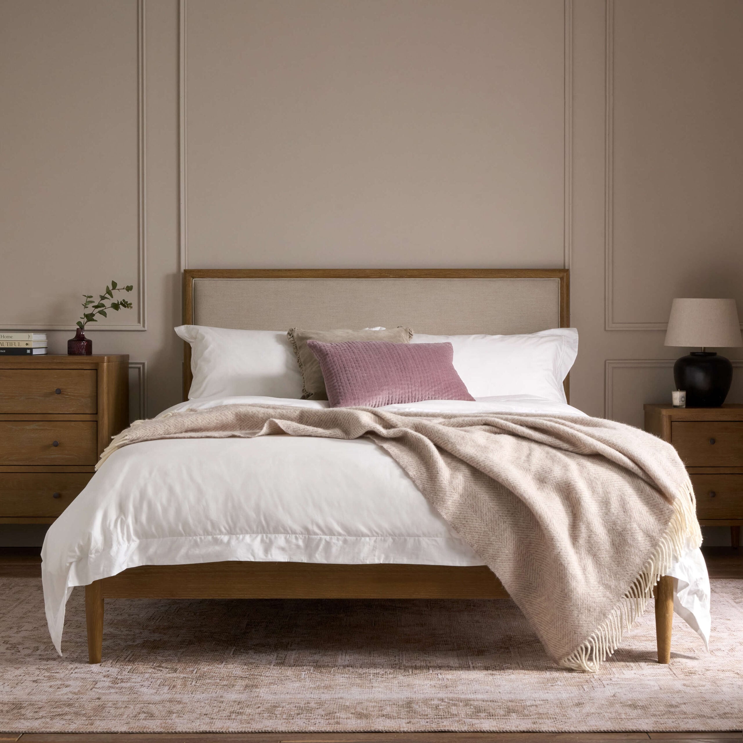 Adina weathered oak bed with a softly upholstered headboard