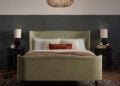 Charlotte upholstered bed styled in a calm bedroom setting