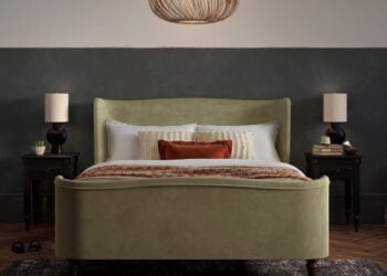 Charlotte upholstered bed styled in a calm bedroom setting