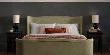 Charlotte upholstered bed styled in a calm bedroom setting