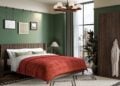Jacob dark wood bed frame styled in a bedroom