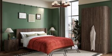 Jacob dark wood bed frame styled in a bedroom