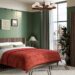Jacob dark wood bed frame styled in a bedroom