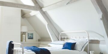 Oliver metal bed styled in a light bedroom