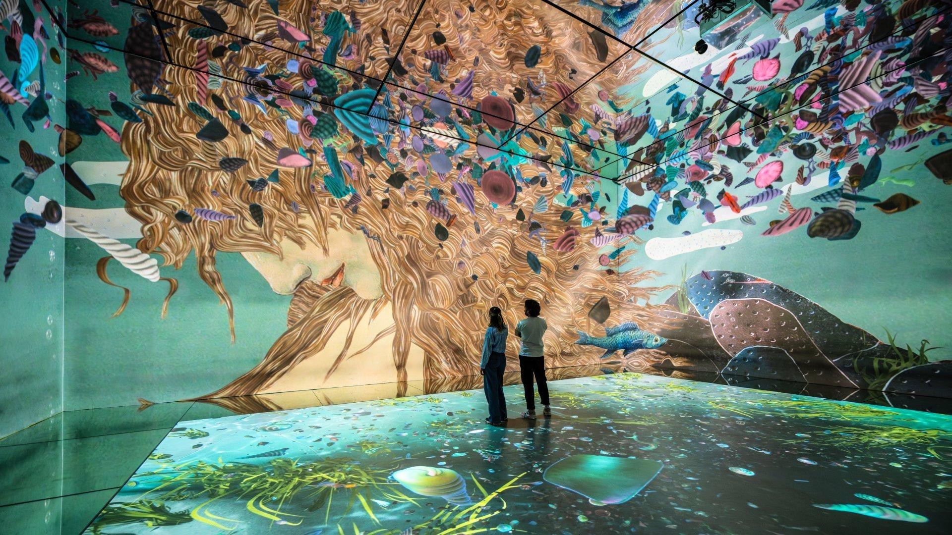 A luminous projected Venus artwork in the Beyond Reality gallery