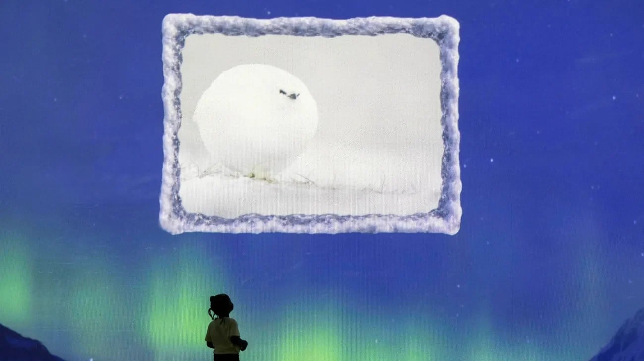 A humorous wildlife scene from the snow and ice habitat at Frameless