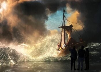 Visitors surrounded by a projected Rembrandt seascape in the World Around Us gallery