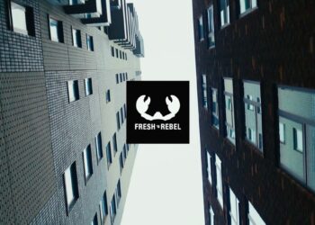 Urbanes Gebäudeensemble mit Fresh 'n Rebel Markenlogo