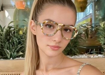 Eyeglasses styled in a summer street-style scene