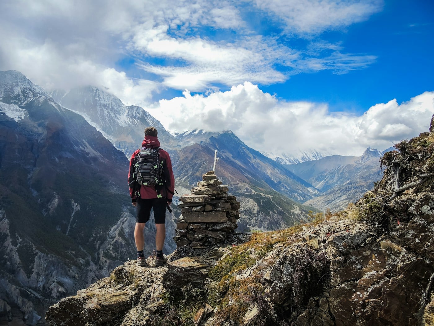 Hiker in an alpine mountain landscape