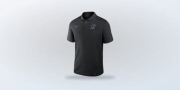 Single side view of black Nike Dri-FIT Victory Polo with Miami Marlins graphic