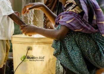 Family receiving clean water support through Muslim Aid