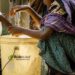 Family receiving clean water support through Muslim Aid