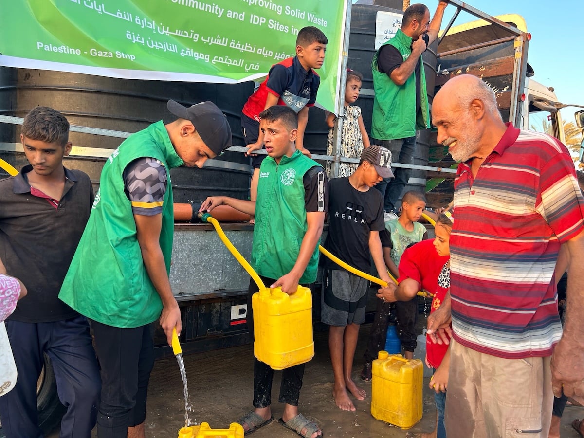 Community water access scene from Muslim Aid