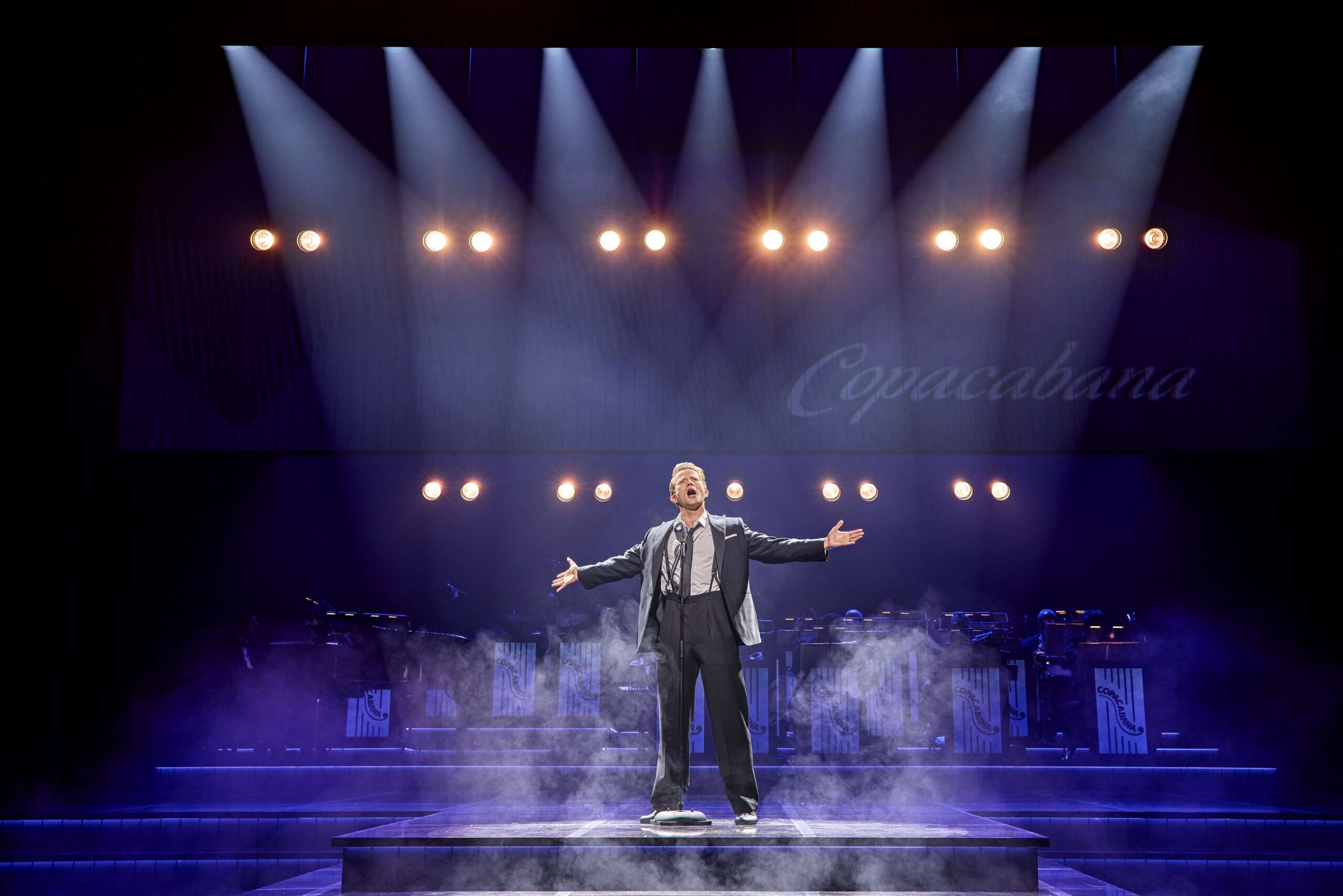 Lead performer singing in Sinatra The Musical