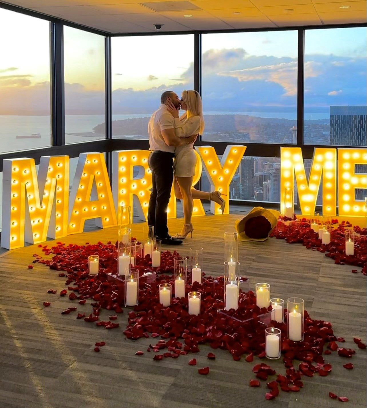 Couple celebrating a private proposal at Sky View Observatory