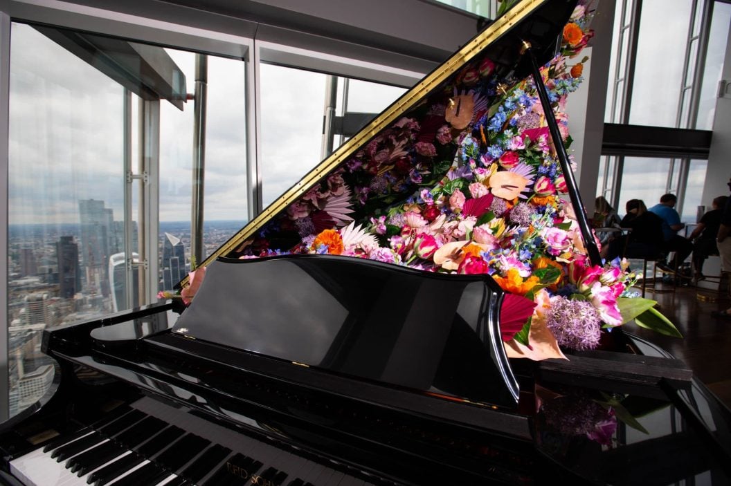 Floral grand piano display inside The View from The Shard