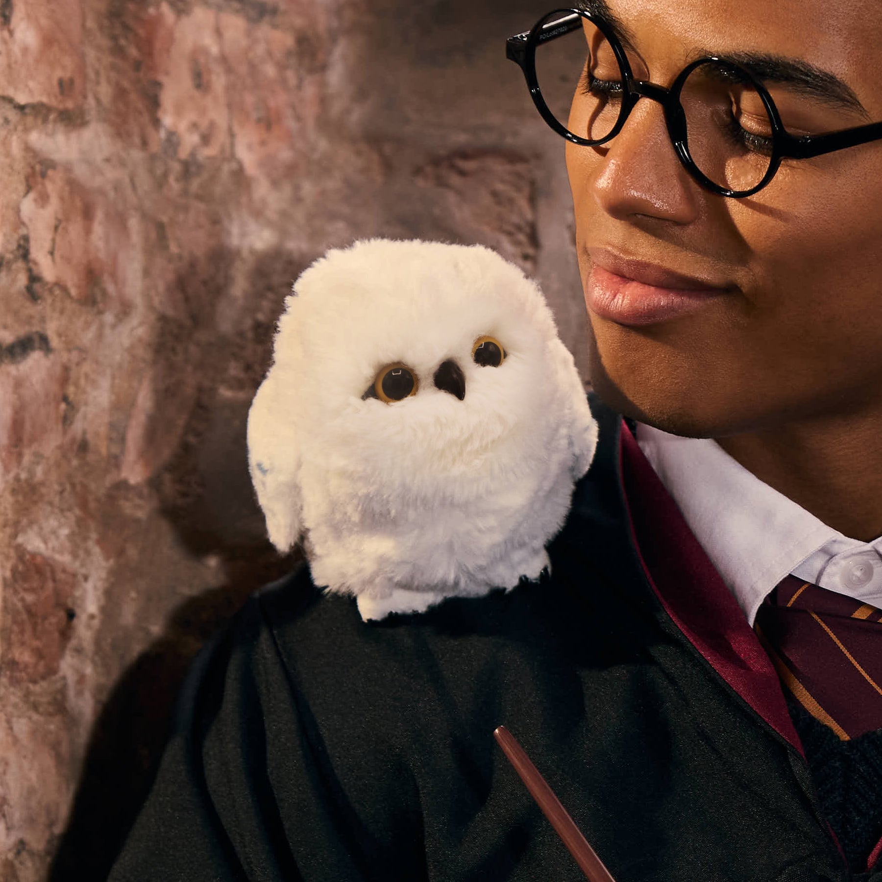 Interactive Hedwig plush shown in a lifestyle product photo