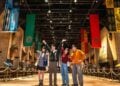 Visitors experiencing the Great Hall set at Warner Bros. Studios Japan