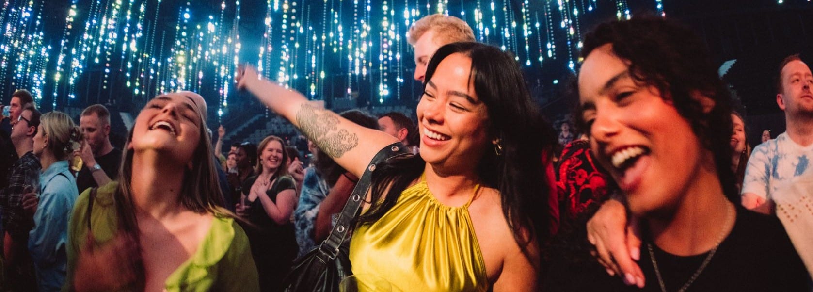 Friends celebrating at an ABBA Voyage party