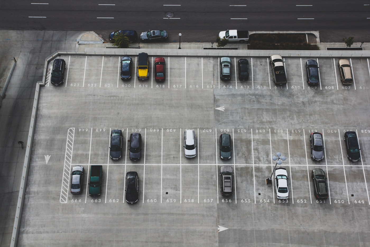 Cars parked in an outdoor car park