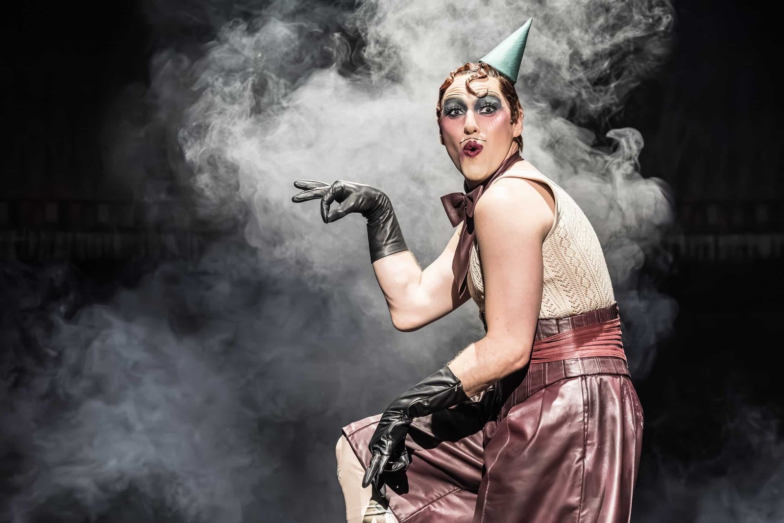 Cabaret cast performing together on stage