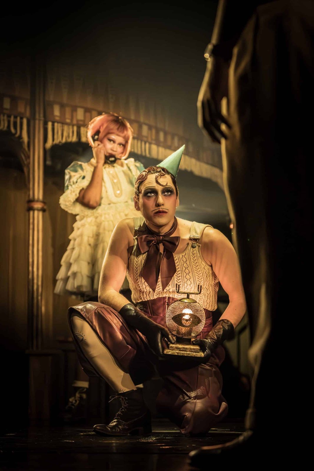 Cabaret performers in theatrical costumes